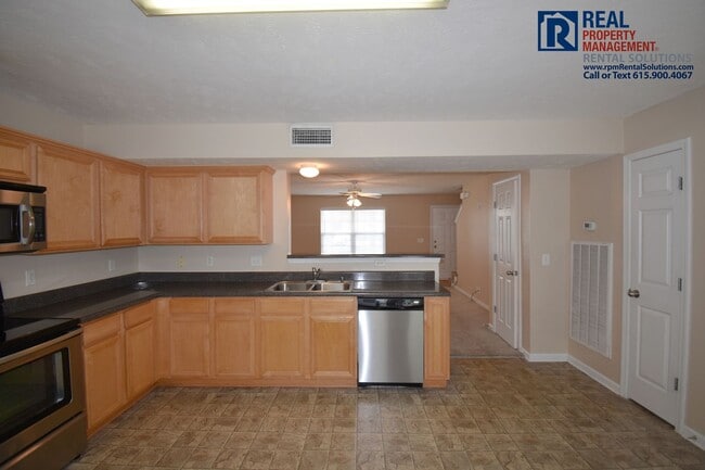 Building Photo - Adorable End Unit 2 bd Townhome with lawnc...