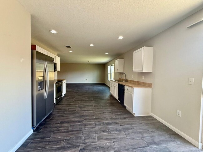 Building Photo - Spacious Two-Story Home: 4 Beds, 2.5 Baths...