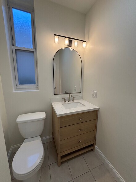 Main level hallway 1/2 bath - 2608 W Evergreen Ave