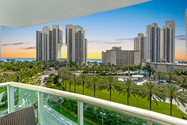 Building Photo - 19370 Collins Ave