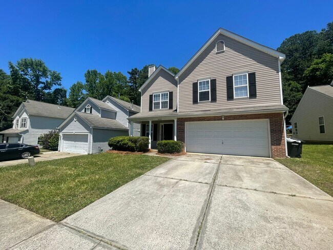 Building Photo - Come take a look at the gorgeous newly renovated 4 bedroom, 2.5 bath, 2 car garage home located i...