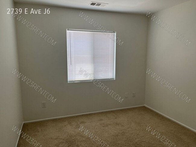 Building Photo - 2739 E Ave J6