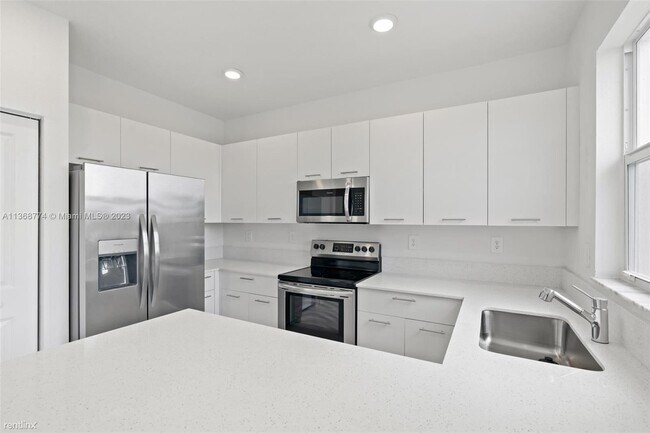Primary Photo - 3 br, 2.5 bath Townhome - 12725 NW 24th Ave