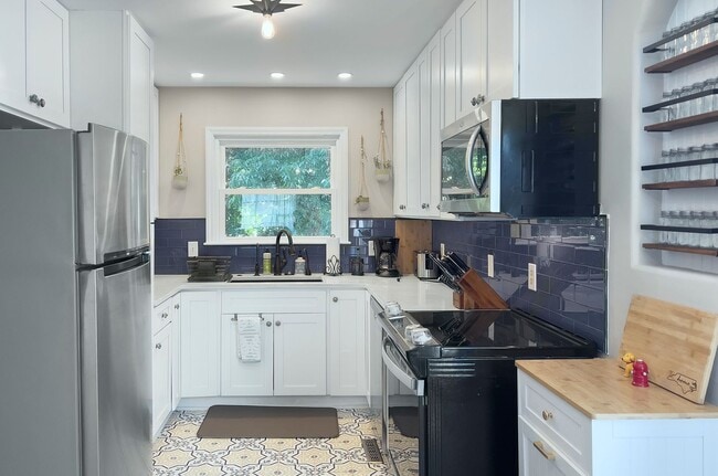 Building Photo - Discover this beautifully updated full brick single-family home in the heart of the historic Wesl...