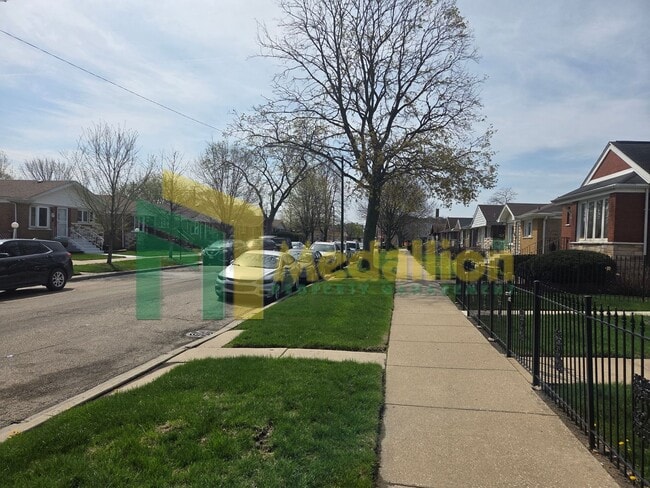 Building Photo - Spacious 4-Bedroom Home with Finished Basement and Yard Space