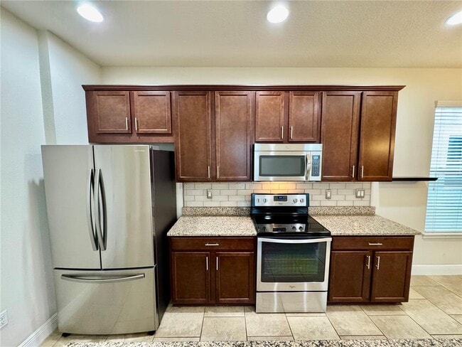 Building Photo - 7208 Milestone Dr