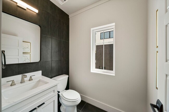 Building Photo - Discover modern elegance in the newly constructed Edgewater Condominiums, a boutique community fe...