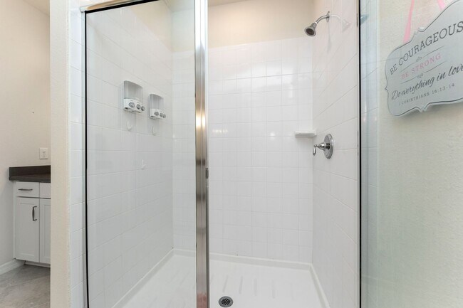 Building Photo - Introducing a captivating 3-story townhome...