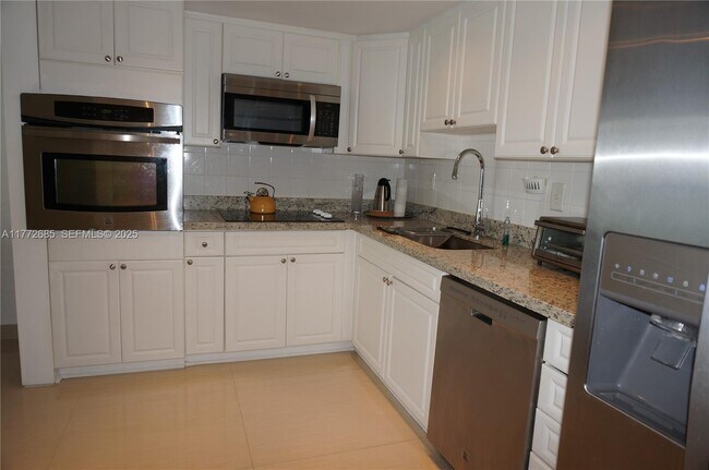 Building Photo - 19380 Collins Ave