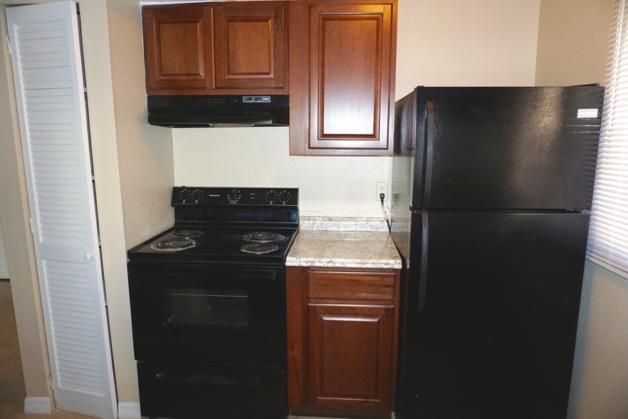 Renovated 1 Bedroom Kitchen - Renaissance at Strawberry Creek Apartments