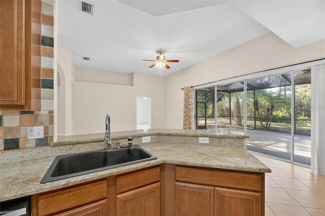 Building Photo - 9115 Pinebreeze Dr