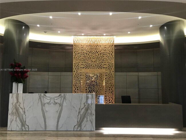 Building Photo - 10275 Collins Ave