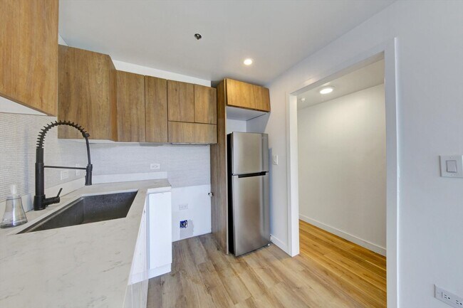 Building Photo - AMAZING NEW CONSTRUCTION UNIT NEAR DOWNTOWN