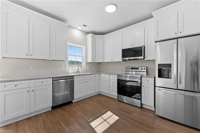 Building Photo - Earn Wealth While Leasing - Like a Homeown...