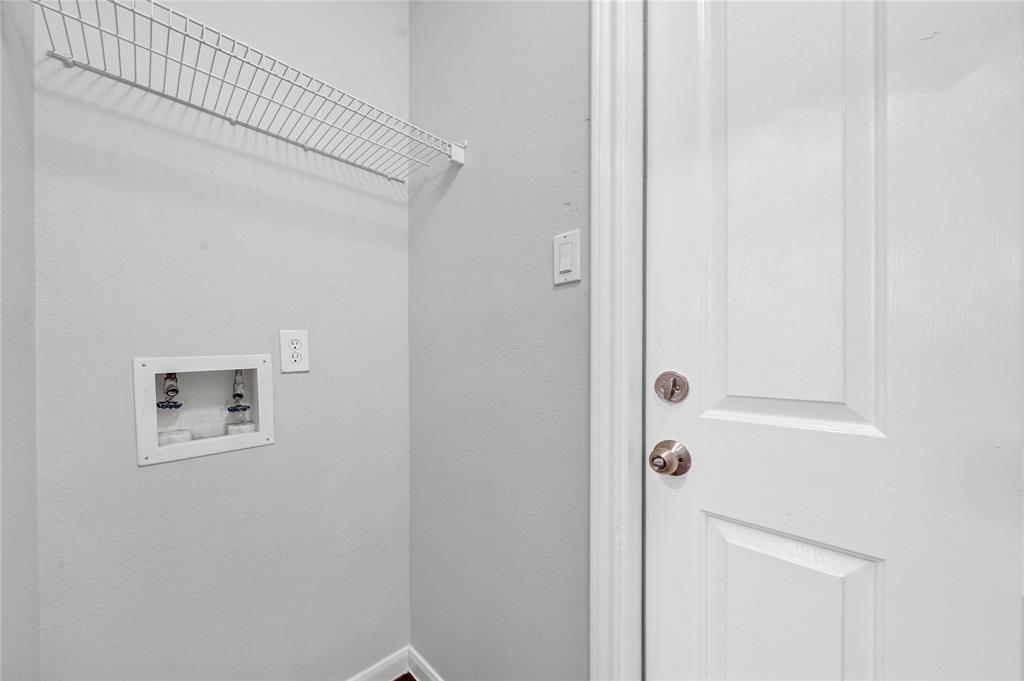 Laundry Room off of the kitchen - 5023 Deer Point Dr