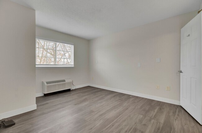 Building Photo - FIRST MONTH FREE- STUDIO APT- Available 1/...