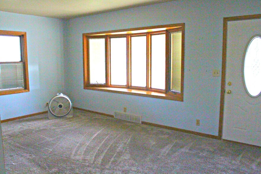 The living room with bow window - 1624 elmhurst ave