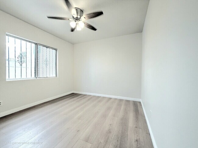 Building Photo - 1323 W 58th St