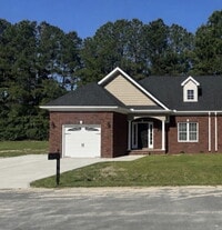 Building Photo - Low Maintenance Lifestyle! GORGEOUS 2 BR | 2 BA Brick Duplex in Rosewood (Goldsboro) *Lawn Care/T...
