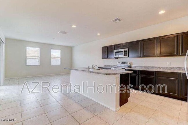 Building Photo - 37748 W Bello Ln