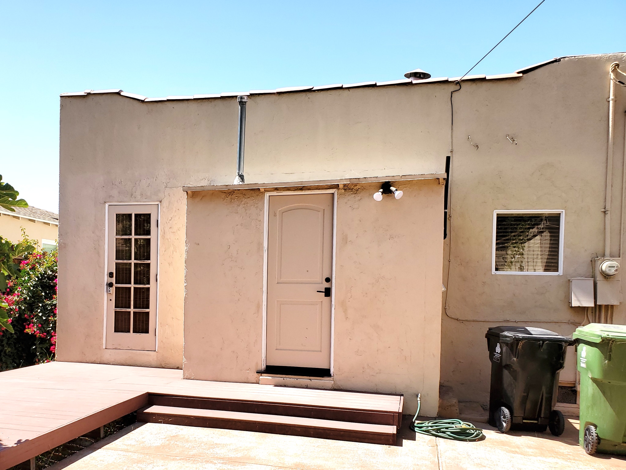 Back of house with patio - 10832 Westminster Ave