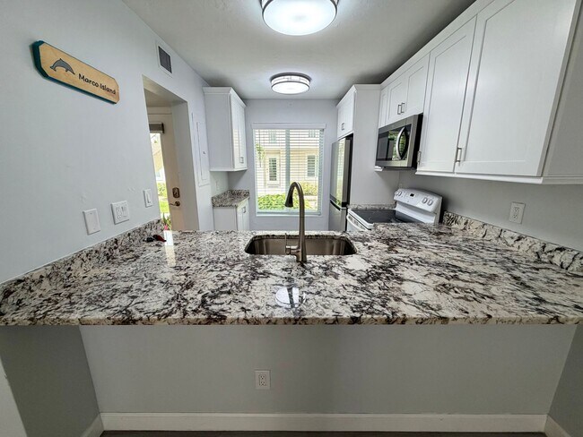 Building Photo - Lovely Unfurnished 2 Bedroom Condo-Estuary of Marco Island