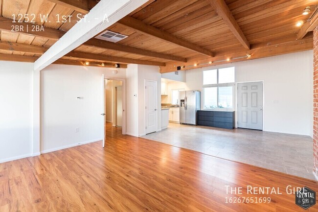 Building Photo - Spectacular 2 Bedroom W/ Exposed Beams & B...