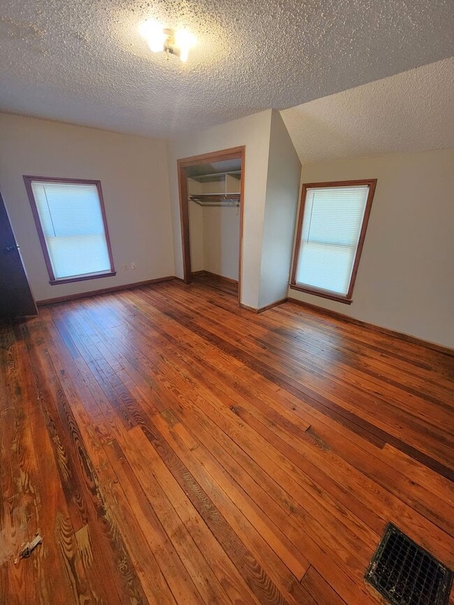 Building Photo - Nice home with oversized 2car gar with work bench and large shaded yard. Country-like setting