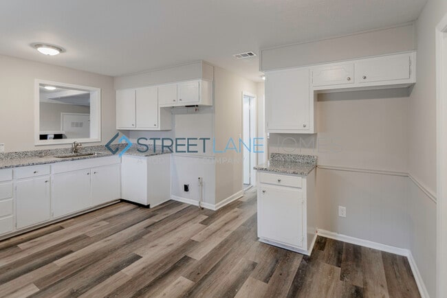 Building Photo - NOW OFFERING HALF OFF THE FIRST FULL MONTH...