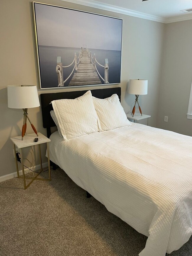 Building Photo - EXECUTIVE FULLY FURNISHED TOWNHOME IN GATED COMMUNITY