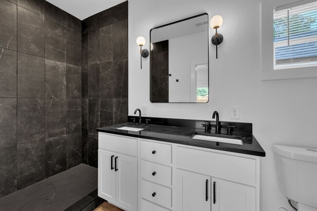 Building Photo - Modern New Construction Townhome with Roof...