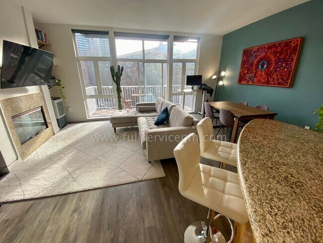 Building Photo - Stylish Capitol Hill Loft Condo w/ Floor-to-Ceiling Windows, Gas Fireplace