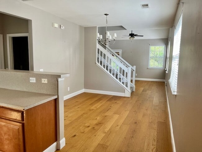 Building Photo - Spacious Move In Ready Townhome on Johns I...