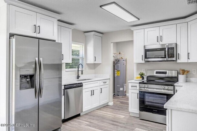 Building Photo - Waterfront 3 BR 2 BA Remodeled Rental Home
