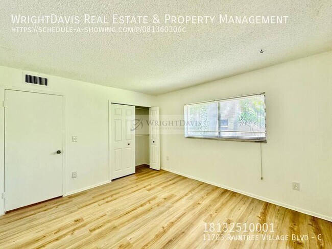 Building Photo - 11703 Raintree Village Blvd
