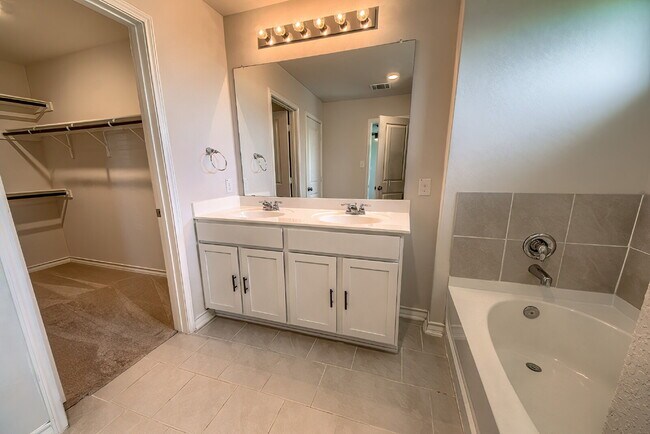 Building Photo - Welcome to this beautifully maintained 4-bedroom, 2-bathroom home in the highly desirable Whisper...