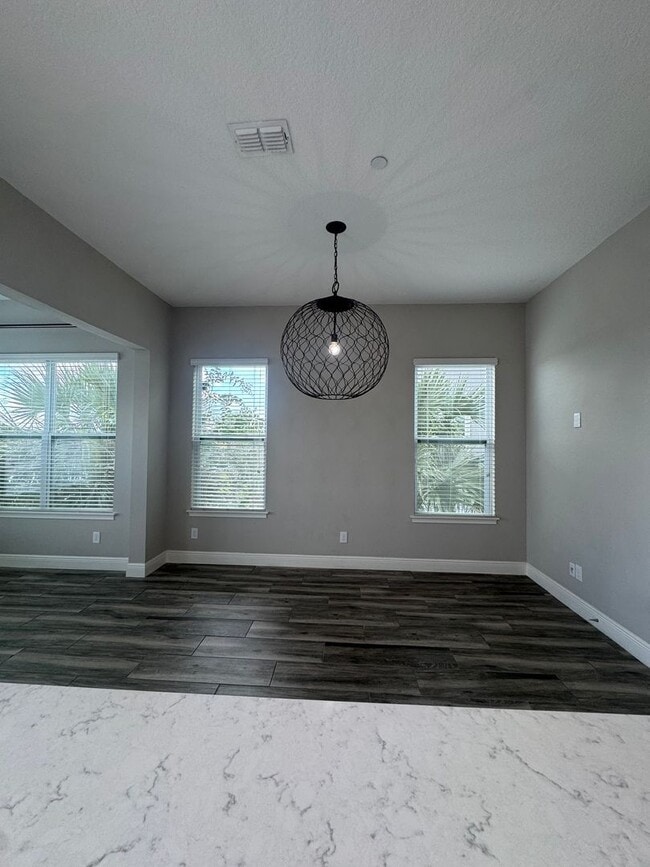 Building Photo - Lake Nona Move-In Special! Save $100/Month | 4 Bed, 3.5 Bath Laureate Park Townhome