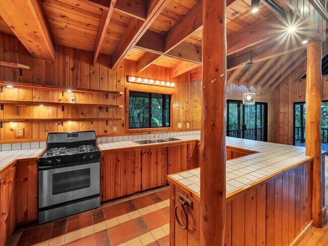 Building Photo - 3 bedrooms 2 bathroom with a large Loft for generational living + storage shed