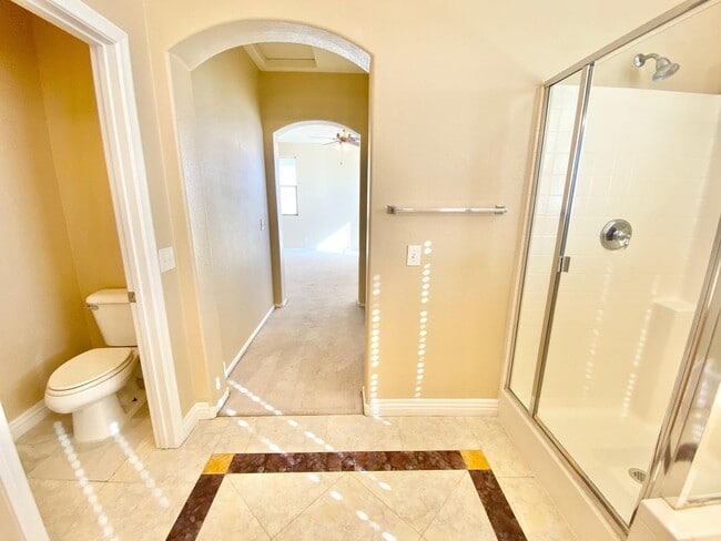 Building Photo - THIS SPACIOUS RESIDENCE FEATURES 4 BEDROOM...
