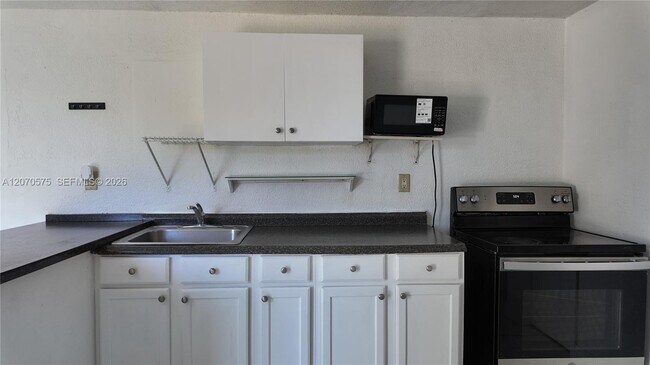 Building Photo - 9815 SW 51st Terrace