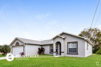 Building Photo - 1209 NW 26th Pl