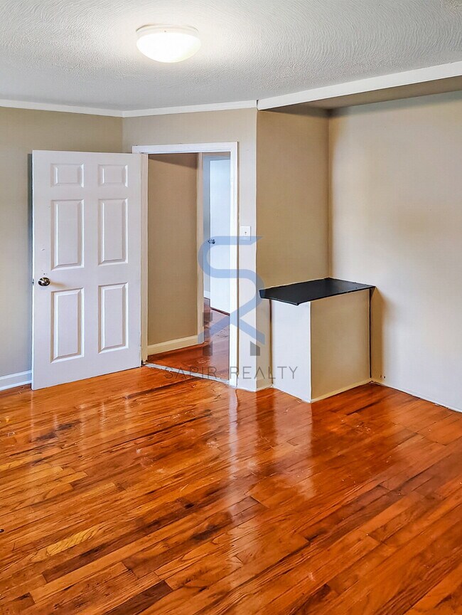 Building Photo - Move in before December 31st and choose your reward: a $250 Amazon Gift Card or a 55" Smart TV!