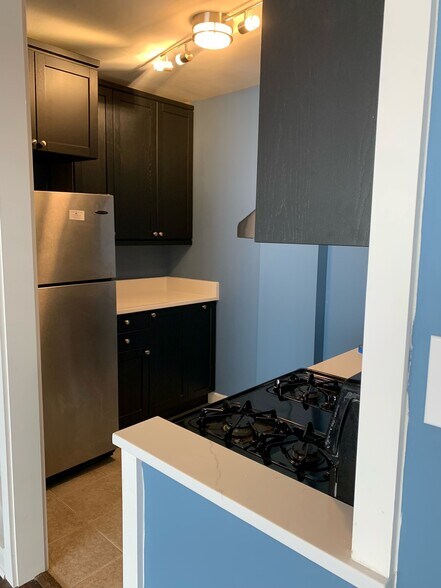 open view to kitchen from living room - 1121 Arlington Blvd
