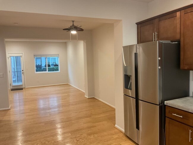 Building Photo - Riverfront Townhome with Tandem Garage & Fenced Yard