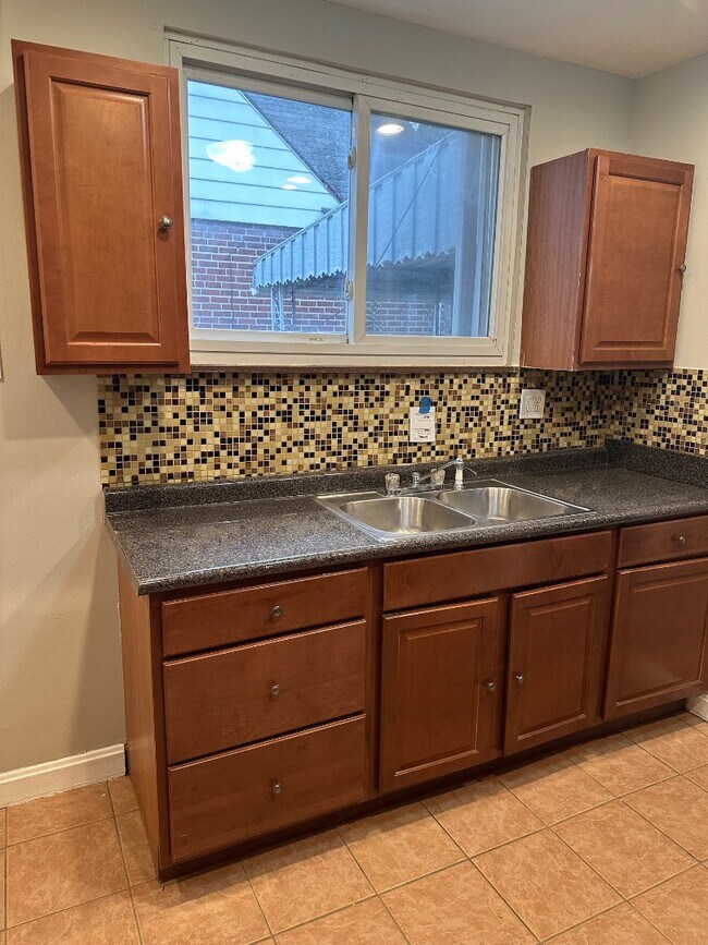 Building Photo - 6044 Mayflower Ave