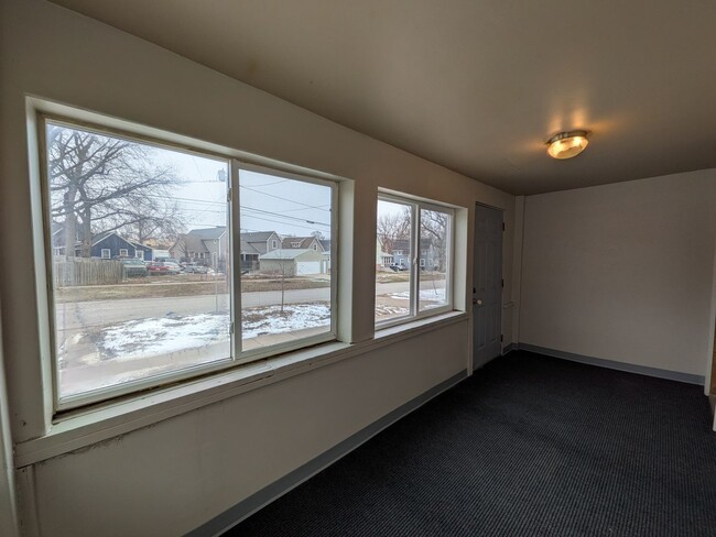 Building Photo - Large 4 Bedroom Home with Garage, Deck, & Fence!