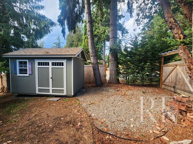 Building Photo - Waterfront Living in Indianola – Dock, Bea...