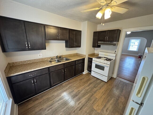 Building Photo - W. Collins Ct., 210 1/2