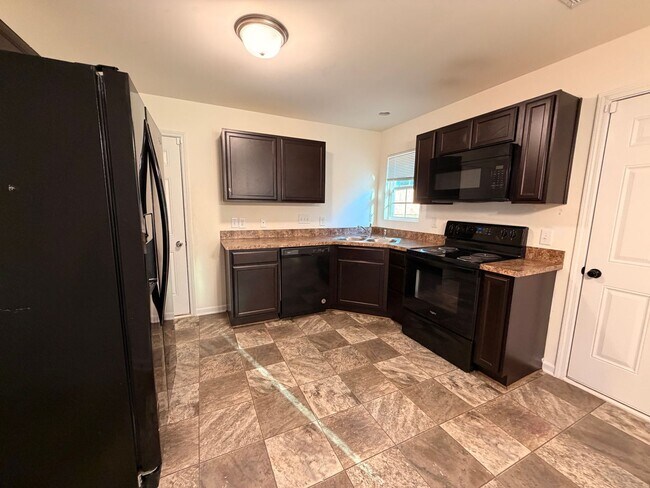 Building Photo - Available Now – Spacious 4BR Home on 1.5 Acres in Rural Hall!