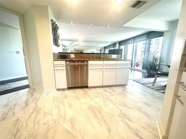 Building Photo - 5950 Pelican Bay Plaza S